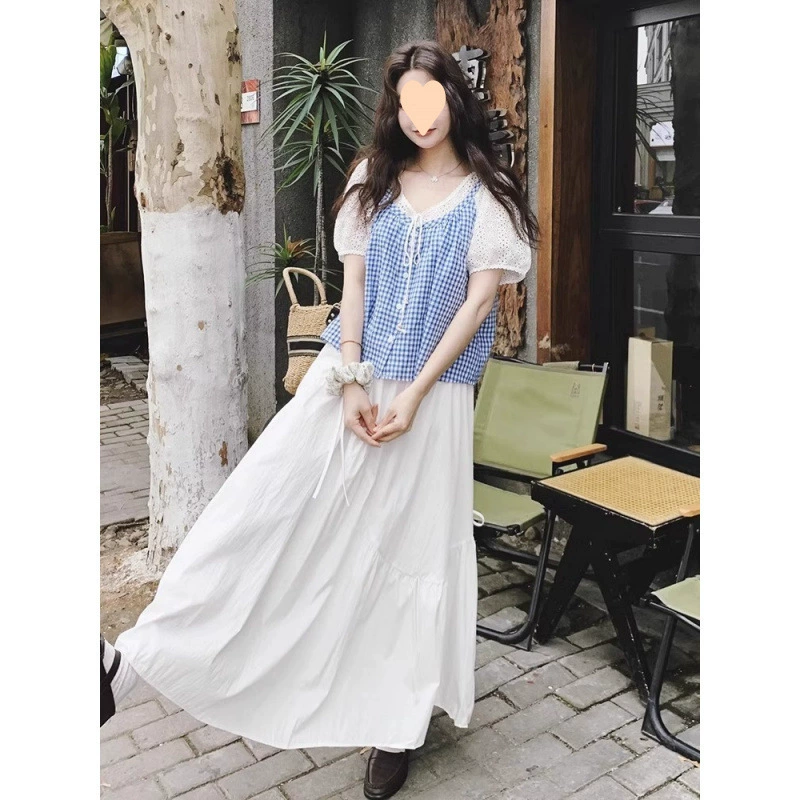 Корейский антивозрастной костюм для женщин, лето 2025, новый стиль, элегантный топ и юбка в клетку с вырезами, комплект из двух предметов