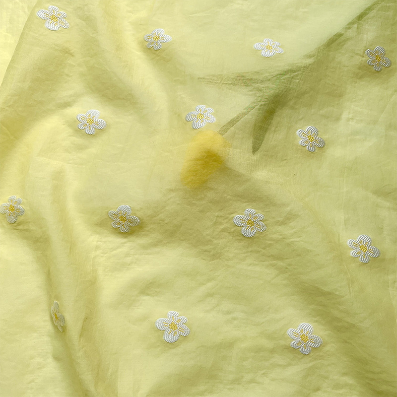 半透黄色立体刺绣浮雕小花提花网纱面料汉服旗袍天丝麻布料短袖
