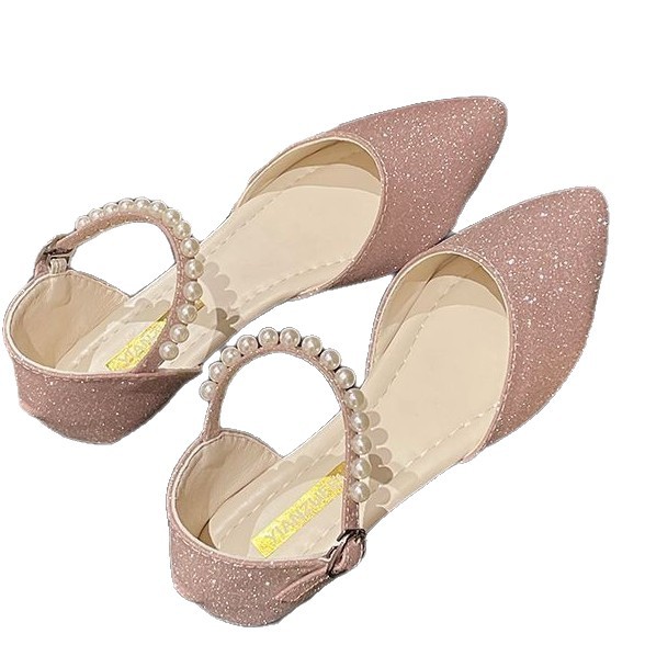 2026 primavera y verano nuevo tipo de perla hueca con sandalias de hadas francesas con punta plana antideslizante sandalias de mujer