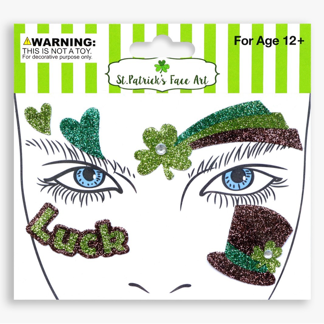 祝日のパーティーの舞台の化粧は顔を貼って化粧のシールを貼ります。