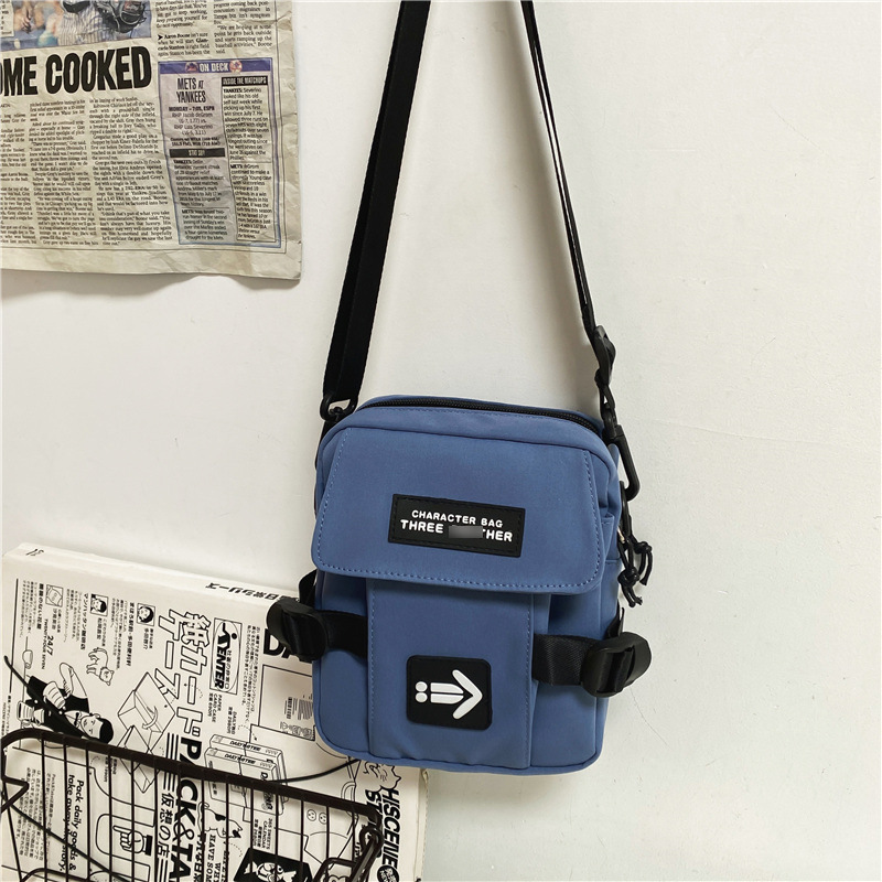 Nueva marca de moda bolsa de mensajero de los hombres de moda japonesa de la calle fresco de los hombres y de las mujeres bolsa de teléfono móvil ropa de trabajo estilo estudiante de hombro bolsa de mensajero