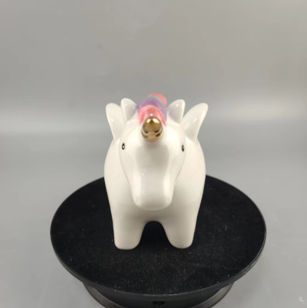 Unicornio de cerámica pintada europea creativa de dibujos animados para niños adorable depósito de decoración creativa para el hogar 1 de junio