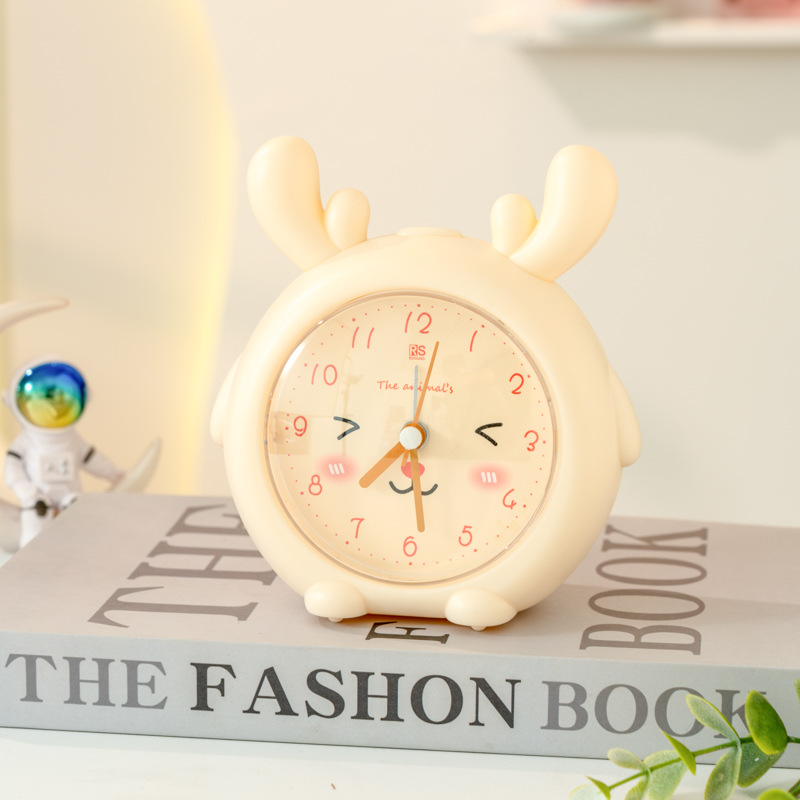 Fábrica directa de cuerno de ciervo despertador de dibujos animados color caramelo silencioso con lámpara despertador para estudiantes WenChuang pequeño despertador especial