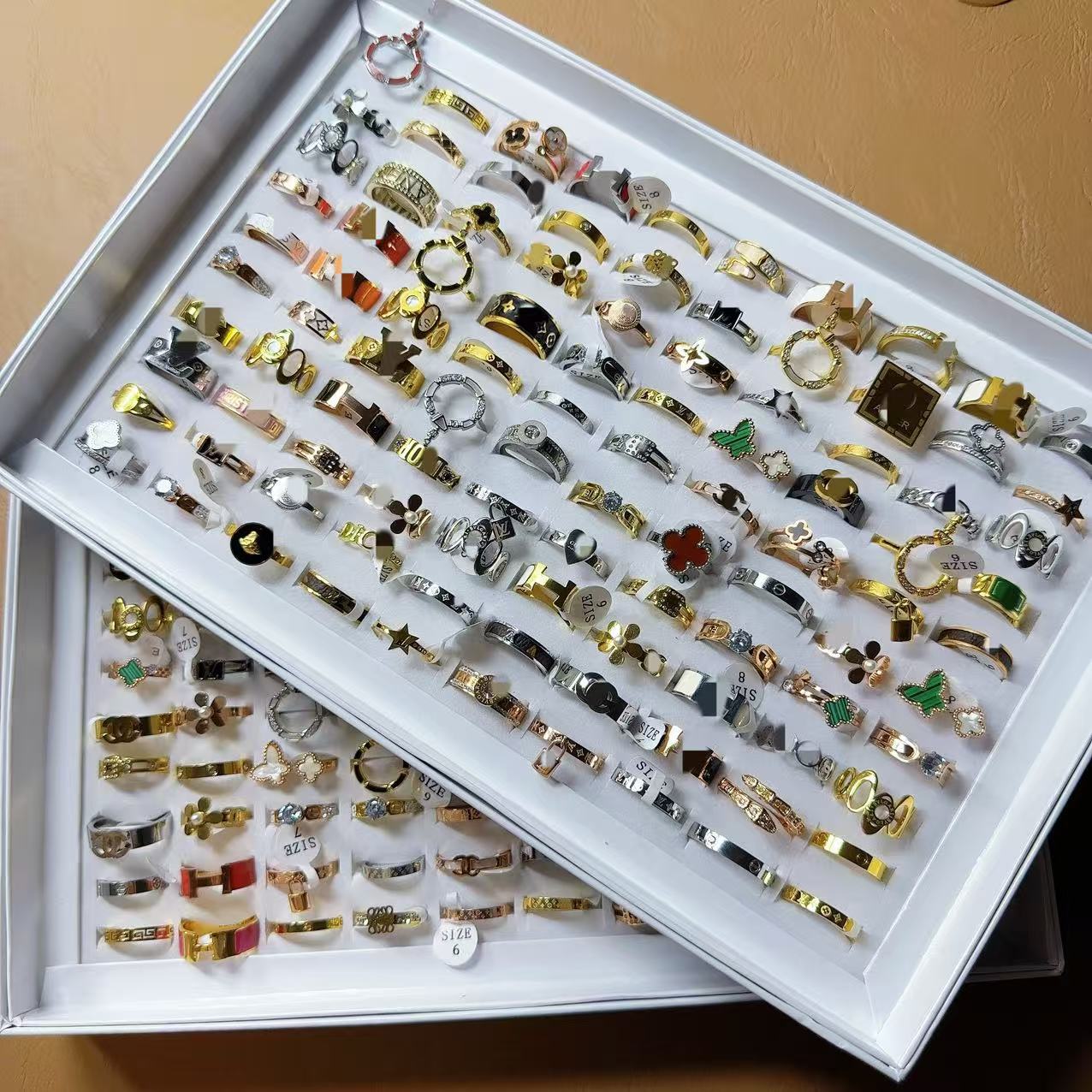 European and American Big-Name Brand Popular Rings, Titanium Steel Electroplated with Real Gold, Color-Preserving, Micro-Inlaid Zircon Rings, Wholesale, Elegant for Women