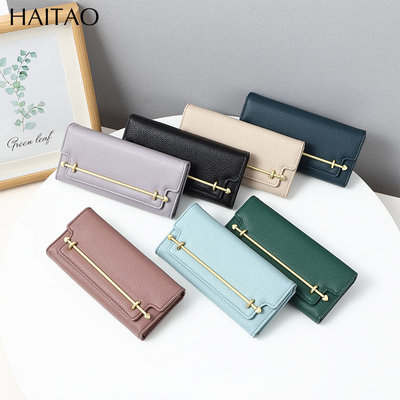 Cartera de mujer, estilo largo, lujo ligero, monedero de nicho, color sólido de alta gama, bolso de mano con tapa abatible creativa, venta al por mayor.