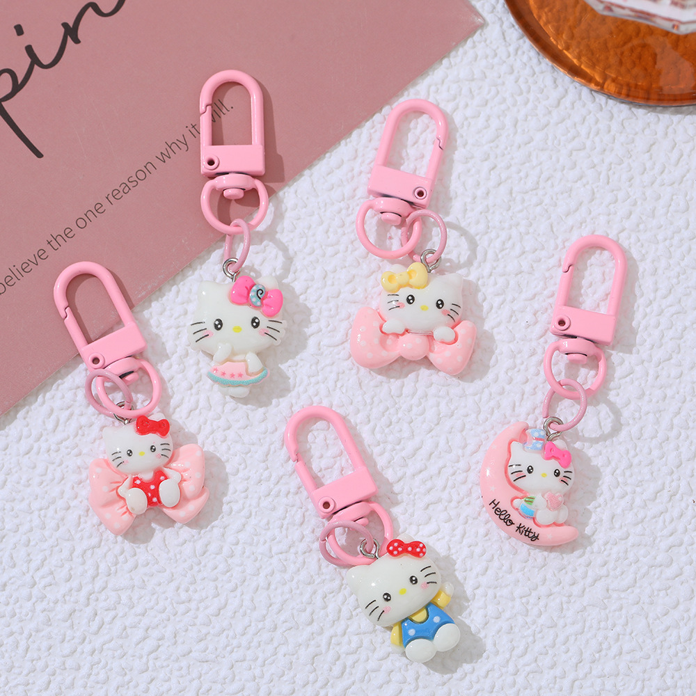 Cartoon Moon Cat DIY accesorios de resina llaveros Sanrio arco gato bolsas colgantes de chicas