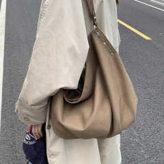 休闲通勤大容量帆布包包女2025新款轻便百搭斜挎包软面单肩托特包