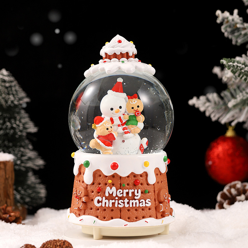 Una variedad de regalos de decoración de Navidad Navidad iluminante bola de cristal caja de música ventana diseño de velas lámparas de viento árbol de Navidad