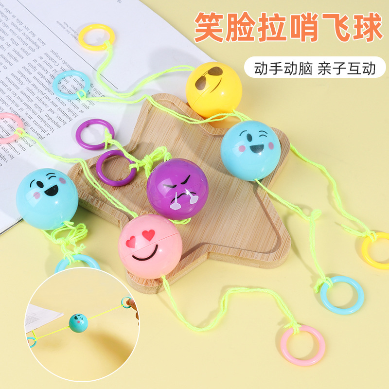 Smiley, silbato, bola voladora, ejercicio ojo-mano para niños, volante de línea de tracción para niños, juguete de descompresión, juguete educativo infantil