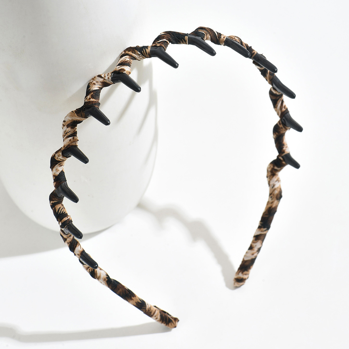 Tela esponjosa envuelta con dientes joyas para el cabello de mujer tocado ondulado leopardo joyas para el cabello al por mayor