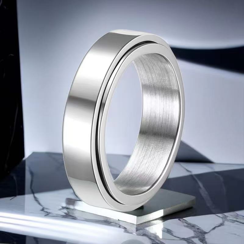 Anillo de acero inoxidable que no se desvanece ins moda masculina giratoria anillo de acero de titanio de nicho frío de los hombres liso