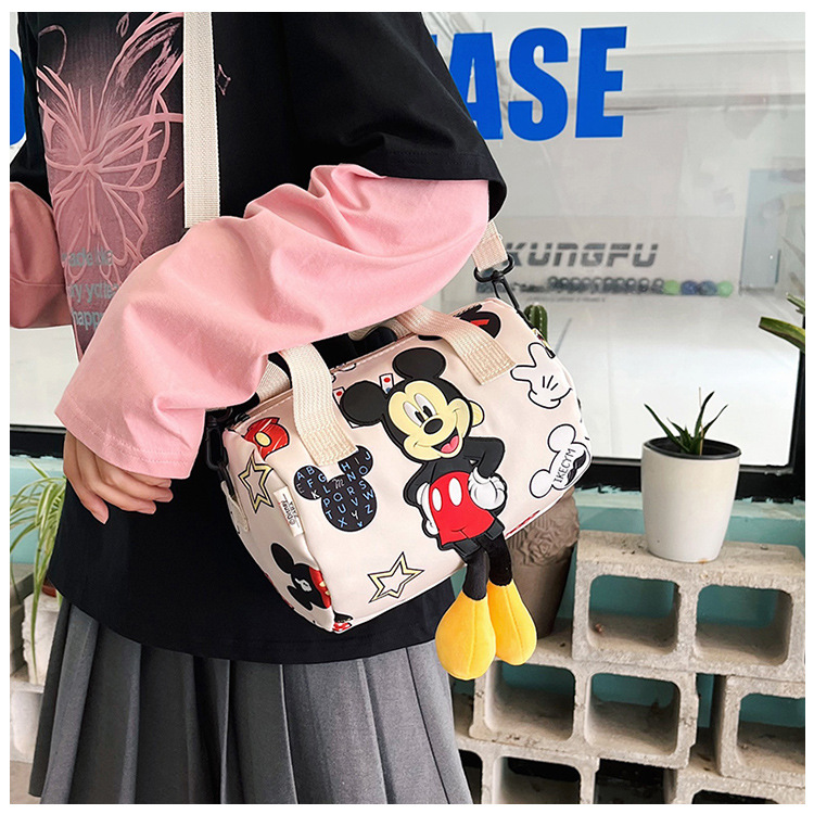 In 2024, the best-selling children's bags will feature cute Mickey Mouse-patterned bowling bags for girls, casual hand-held shoulder bags, and a unique style undefined