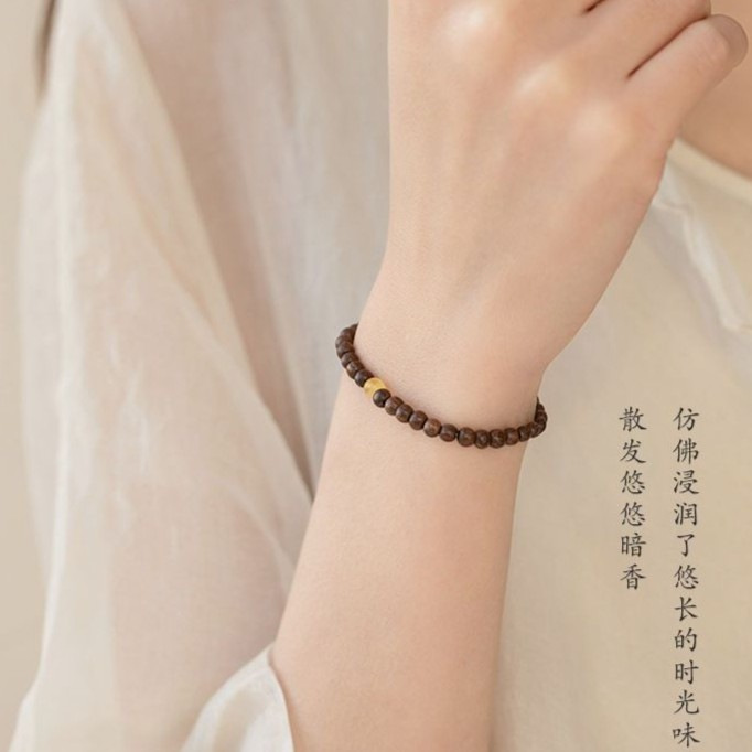 金糸檀の木のブレスレットの女子学生のカップルの簡単な手の串の皿は仏珠の民族の風の文を遊んで数珠のシングルリングの卸売りを遊びます。|undefined