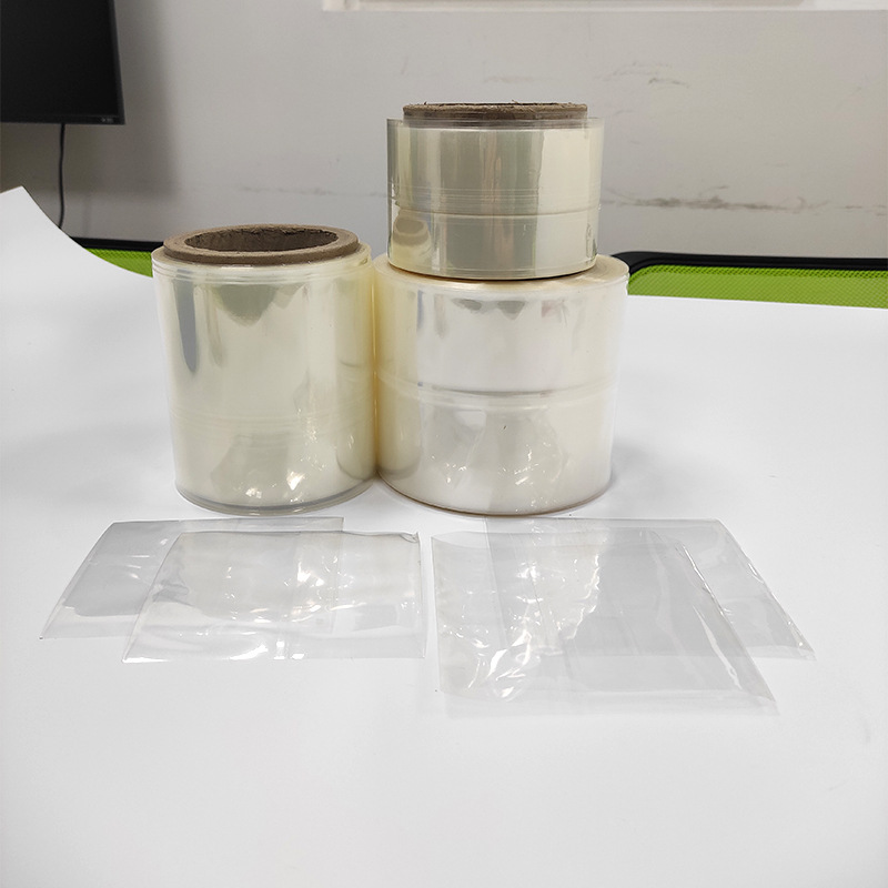 Película de etiqueta transparente al por mayor de fábrica conjunto de película retráctil reticulada etiqueta impresión en color etiqueta caliente Película botella boca película protectora transparente