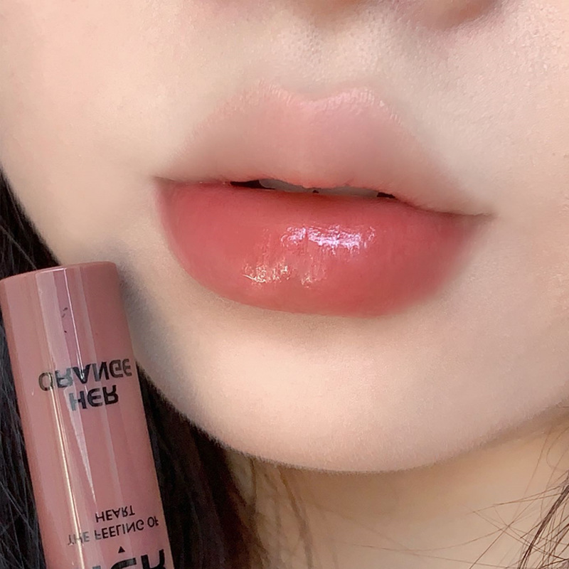 HERORANGE~shimmering water bright mirror surface lip glaze net red, the same type of film-forming water light sensitive glass lip color that is not easy to fade