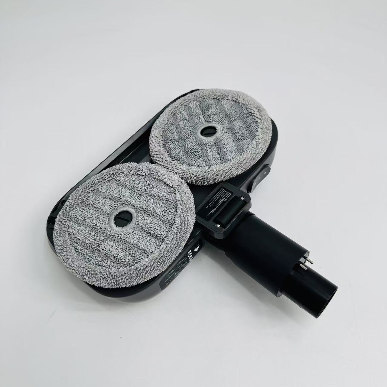 Rotating floor scrubbing suction head