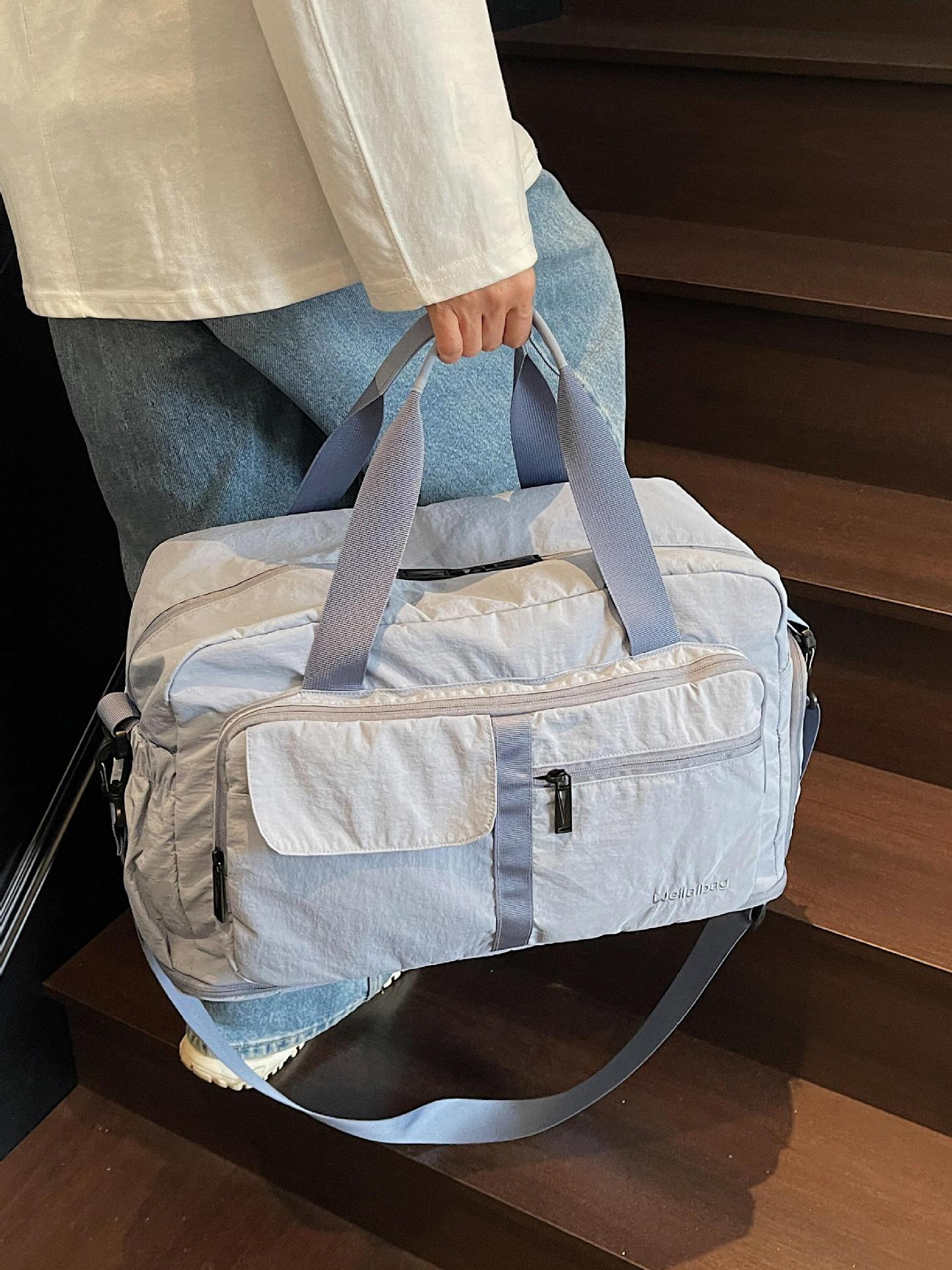 Bolsa de viaje de corta distancia portátil transfronteriza nueva bolsa de almacenamiento portátil de gran capacidad bolsa de yoga de fitness al aire libre bolsa de lona mujer