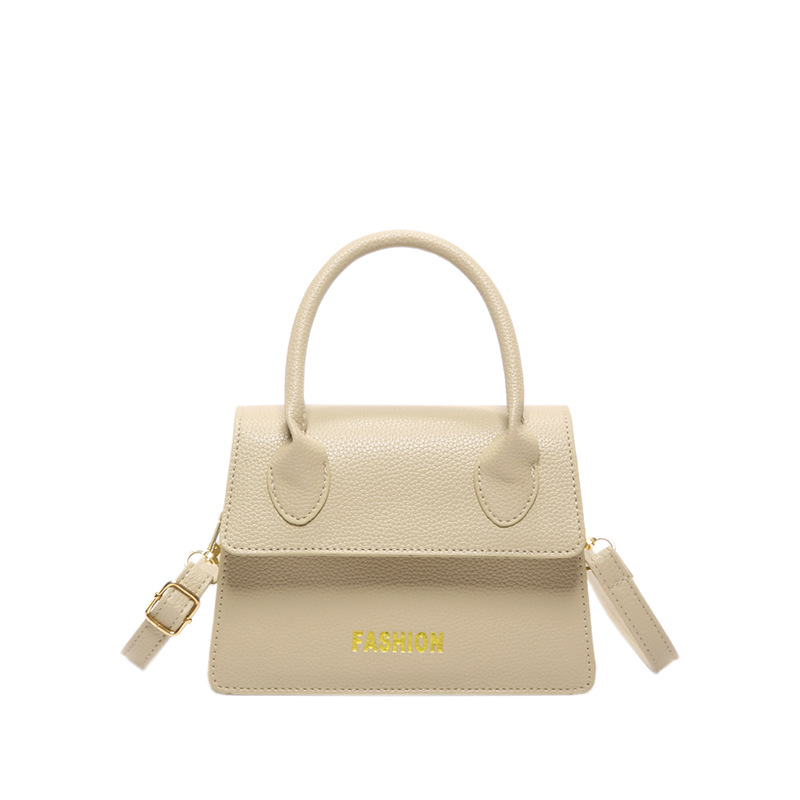 Europa y los Estados Unidos letras de moda bolsos de mano 2024 nuevo lichi estilo retro bolsos de hombro texturizados bolsos de mujer