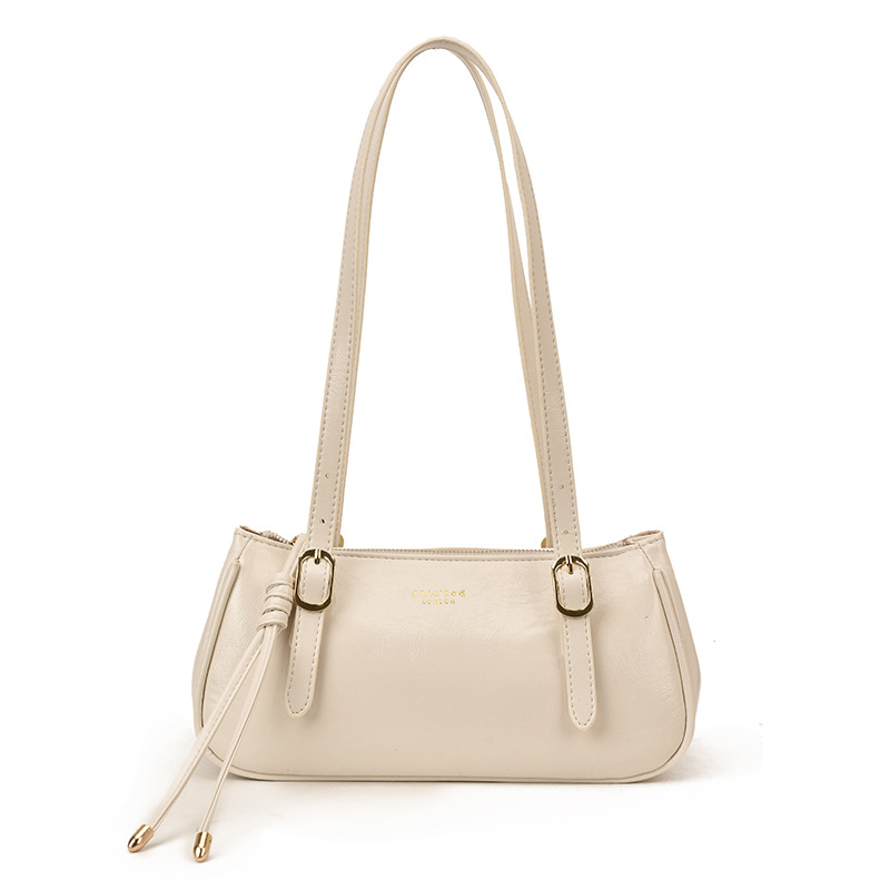 Bolsa de almohada portátil retro transfronteriza para mujeres otoño / invierno 2025 nuevo tipo de alta calidad de viaje a la axila bolso de hombro universal