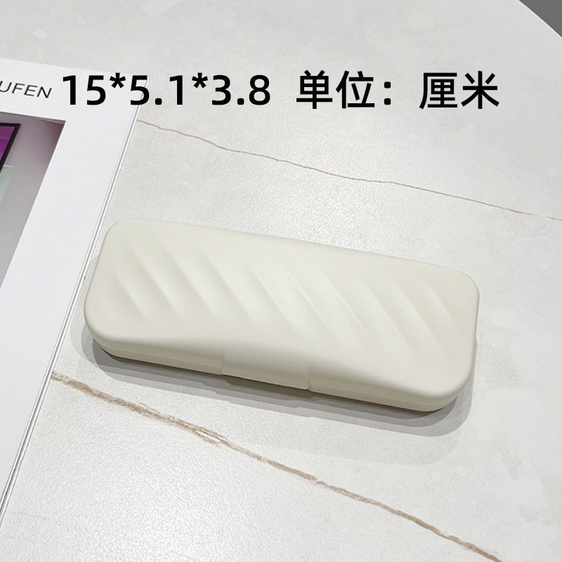 Caja de gafas blanca crema alta sensación portátil anti-compresión ins caja de embalaje de gafas de viento fábrica al por mayor caja de gafas de plástico