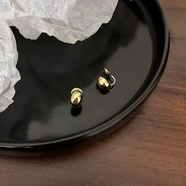Golden mosquito coil, ear clips