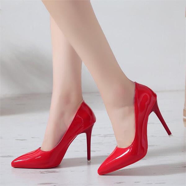 Elegant fashionable high heels nude made of patent leather…
