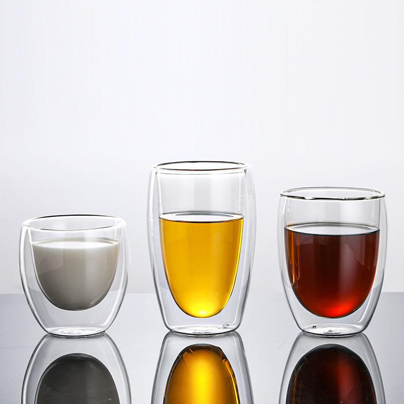 Venta al por mayor aislamiento térmico anti-escaldado de vidrio de doble capa de alto aspecto creativo en forma de huevo jugo leche café vidrio taza de agua taza de té