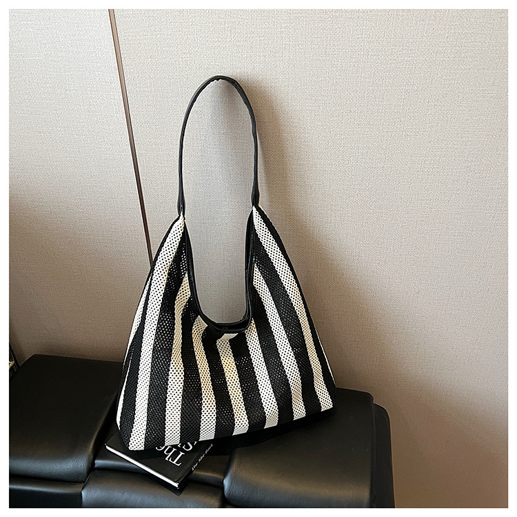 Korean summer new striped woven bag, casual vacation and laid-back style tote bag, hand and shoulder commuter tote bag undefined