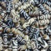 One glance, two eyes, three eyes, four eyes, four eyes, five eyes, five eyes, treasure bottle, lotus, a single pair of tiger teeth pattern expensive agate dzi penetration