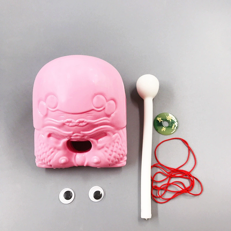 Woodfish percussion toy, plastic, 2" or 3" (6×5×5 cm / 10×8×8 cm), with striker and strap