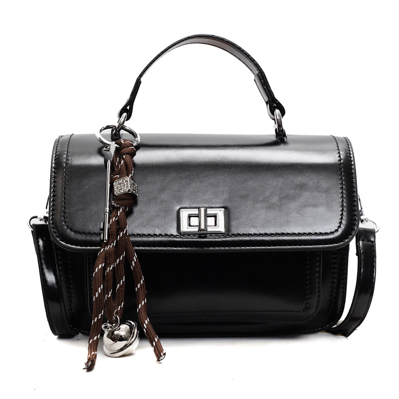 Bolsa de mano pequeña para mujeres 2024 nuevo estilo de piel de cera de aceite retro bolso de viaje de color sólido simple ocio de alta sensación bolso de mochila