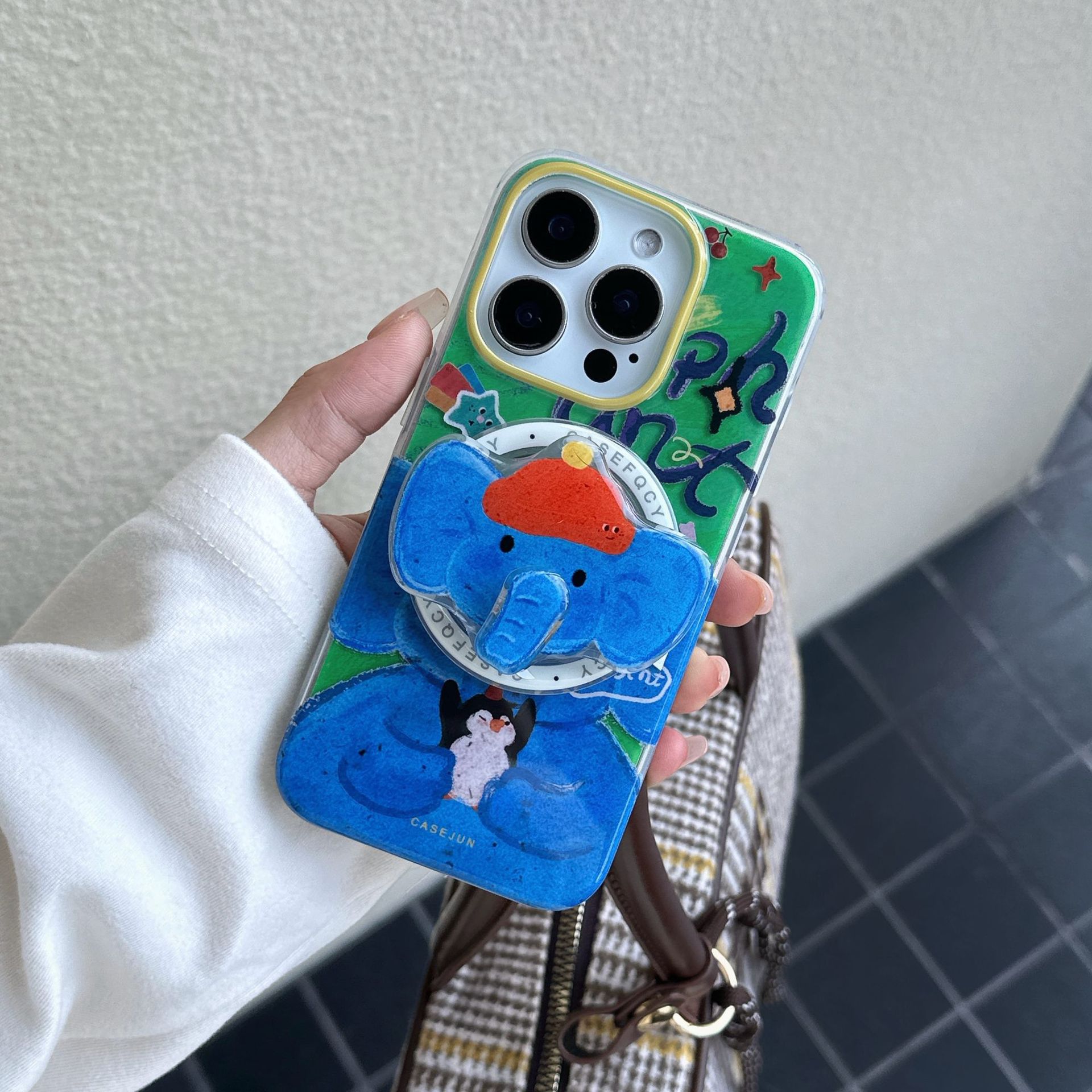 Soporte de nariz de elefante giratorio creativo para Apple 16promax funda para teléfono móvil iPhone15 nuevo 14 atracción magnética