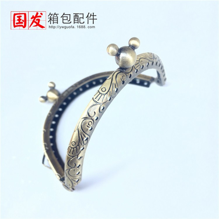 Sin stock: 8.5CM semicircular flor de dragón y phoenix estereoscópico Mickey cabeza oro bronce bolsas hebilla bolsas clip