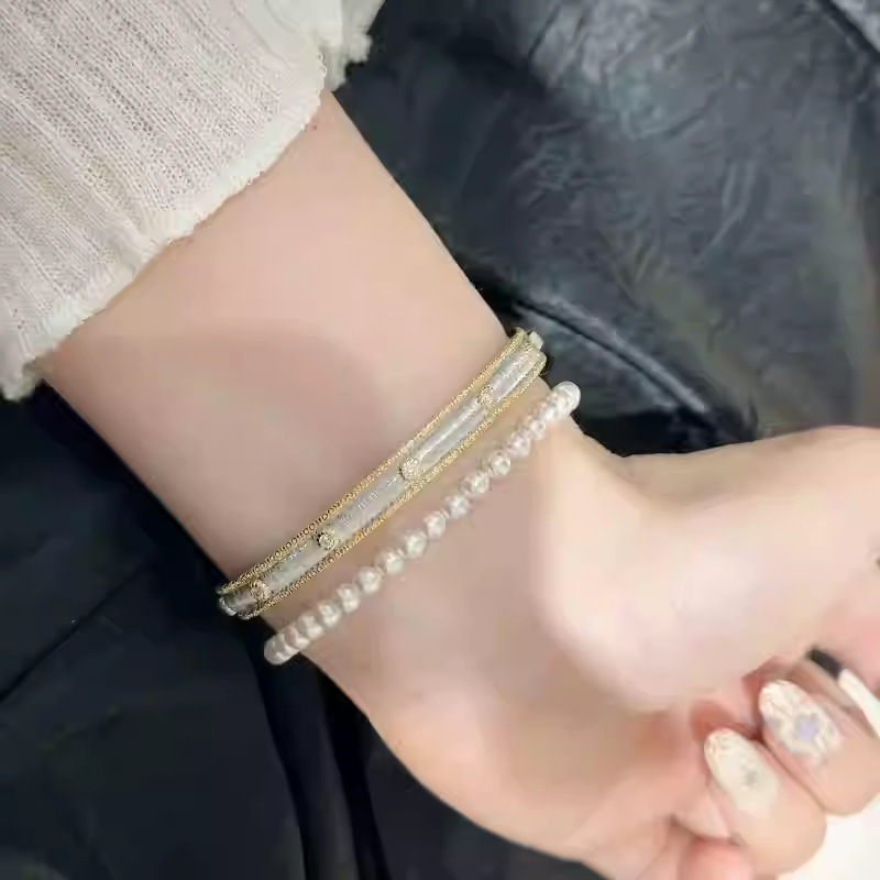 Pulsera abierta de dos colores de circón galvanizado en oro real de 18 quilates, pulsera de lujo ligero de alta gama, joyería de temperamento, joyería femenina