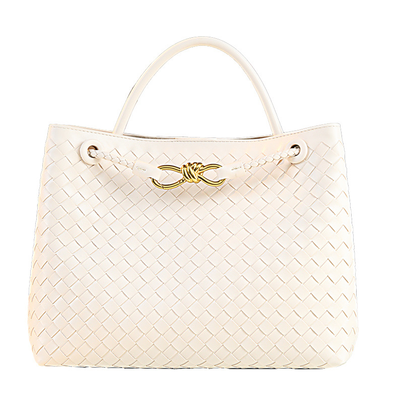 Diseño de moda europeo y americano, hebilla de metal, bowknot, bolso tejido a mano, bolso casual simple de todo fósforo diario