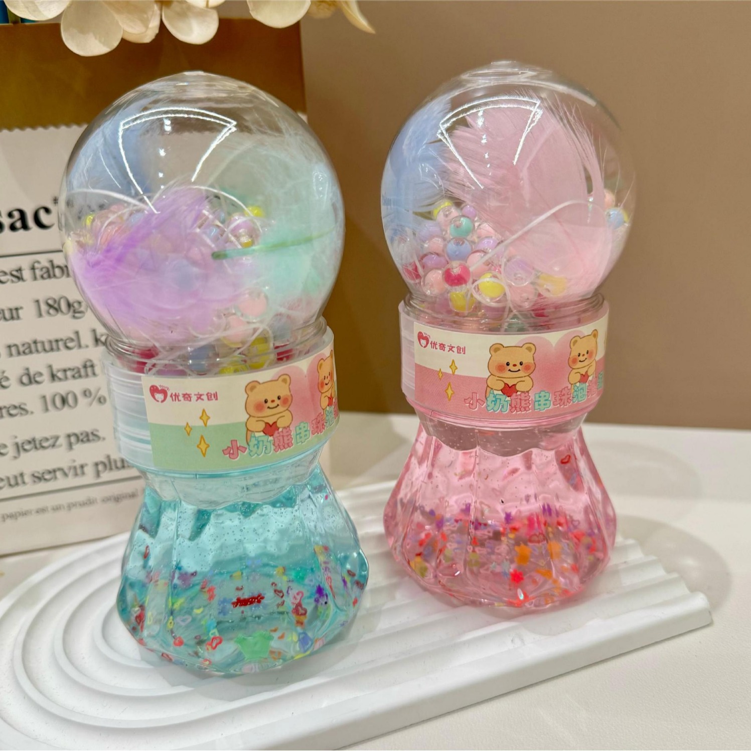 Youqi Wenchuang crema pequeña con cuentas, barro burbuja, rompecabezas, descompresión, juguetes hechos a mano, manos no pegajosas, venta directa de fábrica al por mayor