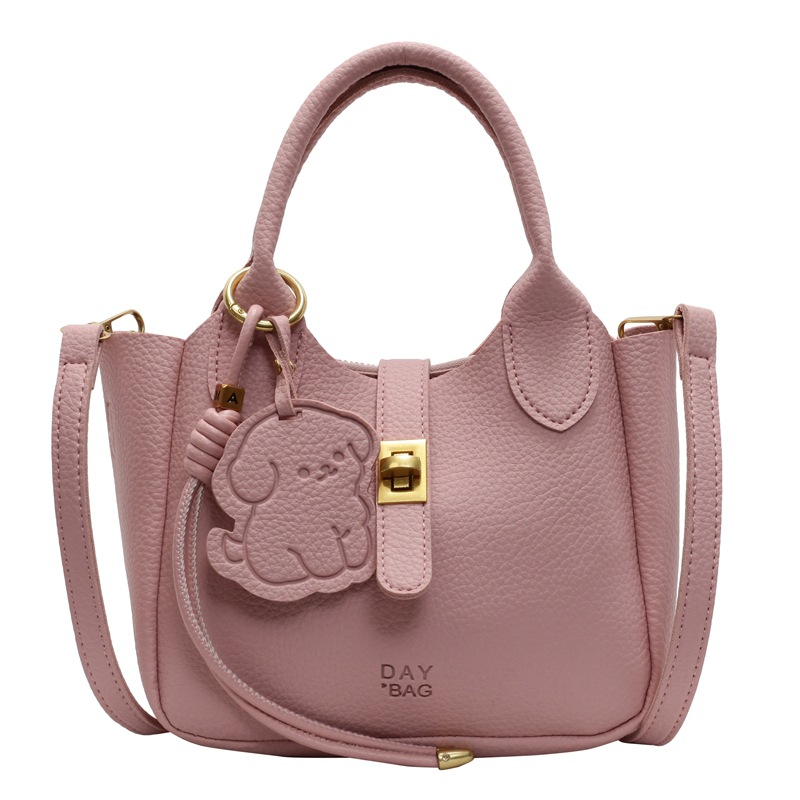 Este año, la popular explosión de la bolsa de cestas de verduras de mano para mujeres 2025 nuevo simple ocio de alta sensación bolso de cubo de transporte