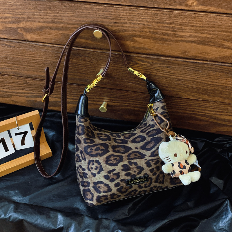 Otoño y invierno de moda nicho leopardo bolso para mujeres 2024 nuevo popular bolso de hombro amplio bolso de brazo