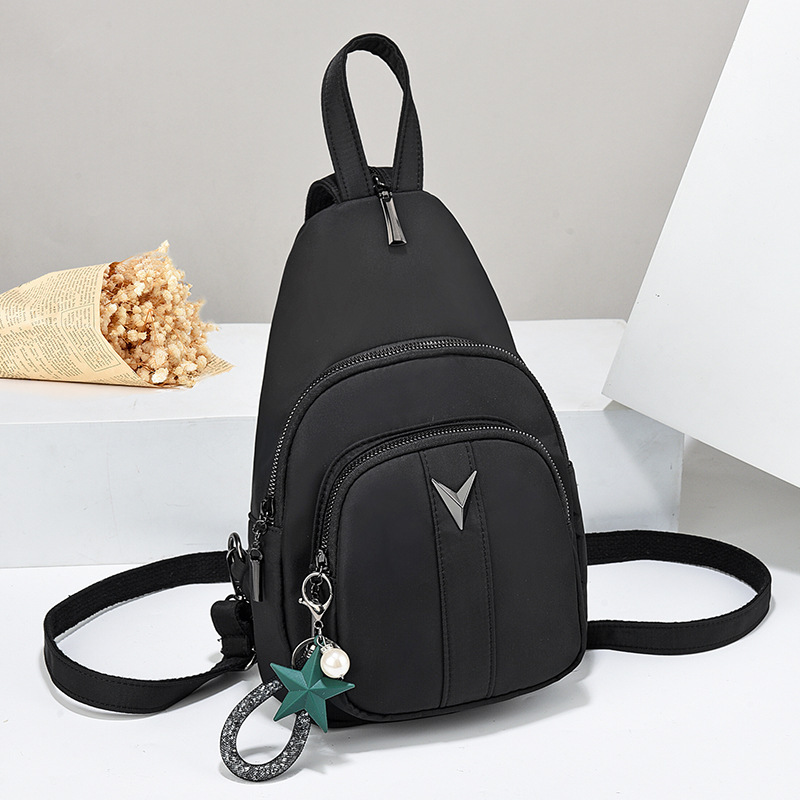 Fabricantes de bolsos de pecho de tela Oxford para mujer nueva mochila de mensajero para mujer de mediana edad, mochila de viaje, bags de gran capacidad de doble uso