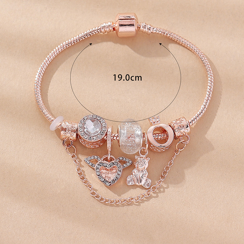 Pulsera Panjia Dora DIY cuentas explosivas transfronterizas colgante de alas de ángel oso corona cuentas de cristal brazalete de cobre