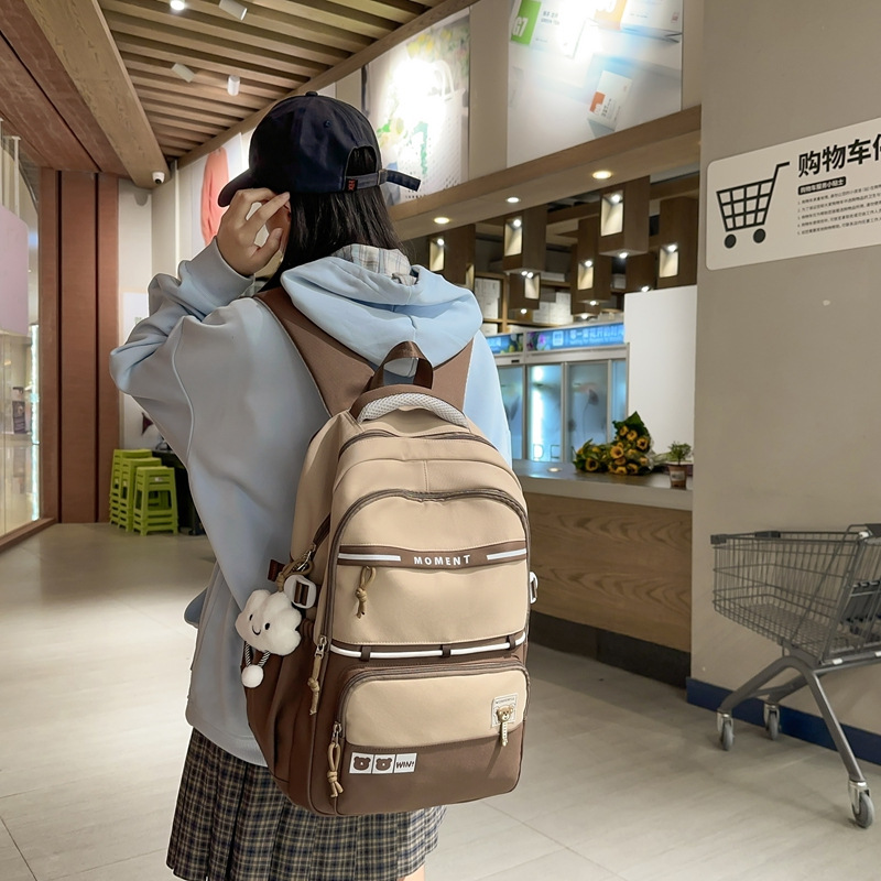 Nuevas mochilas casuales mochilas escolares transfronterizas para estudiantes de secundaria y secundaria mochilas escolares de moda para viajes al aire libre mochilas de estilo escolar