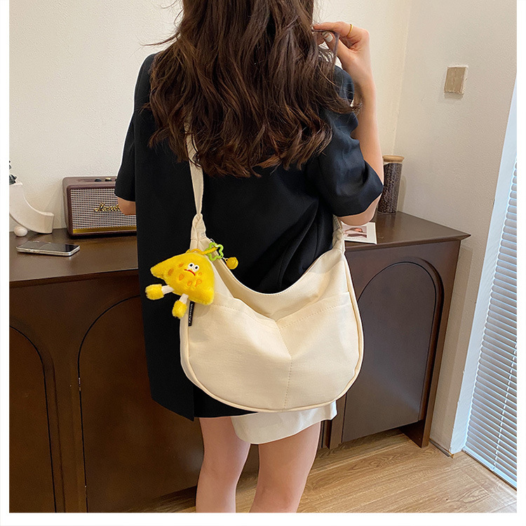 Simple solid-color canvas bag 2024 new style Japanese large-capacity single-shoulder dumpling bag, versatile for school and commuting crossbody bag undefined
