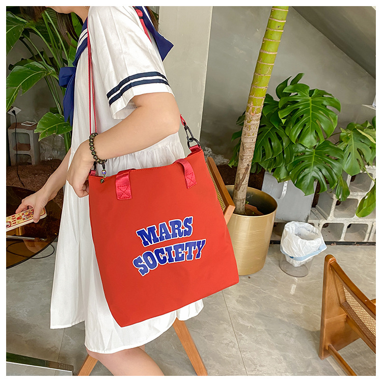 Canvas bag for women, single shoulder, ins crossbody, laid-back style, college student class bag, artistic Japanese style, large capacity, Hong Kong style, chic undefined
