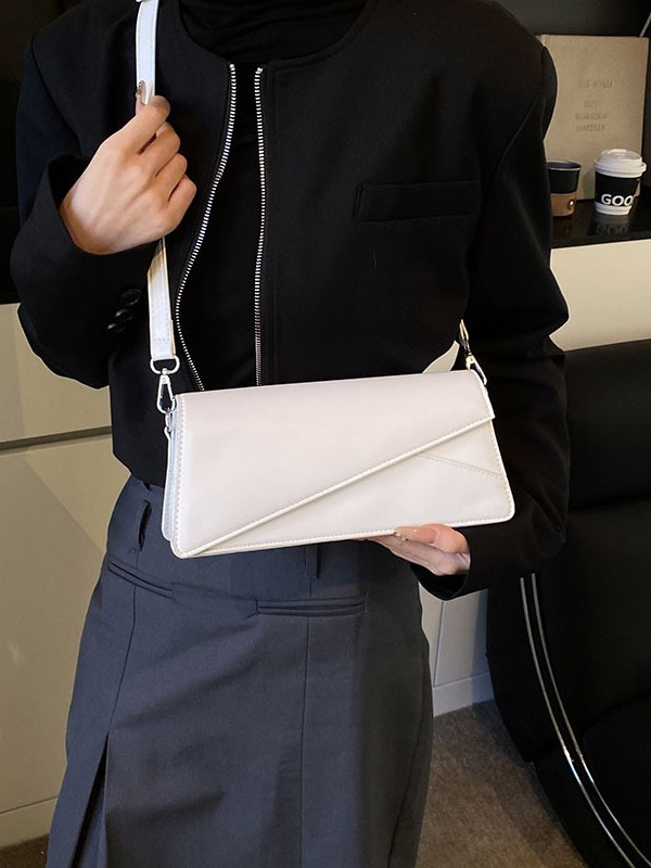 Bolso de diseño de nicho para mujeres 2025, verano nuevo estilo coreano bolso cuadrado simple temperamento casual bolso de hombro de mujer