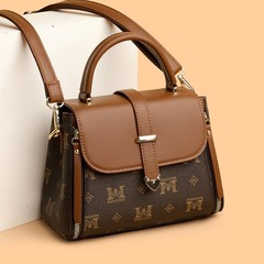 外国貿易のレトロな特包の女性2025の新型の簡単な通勤の斜めのショルダーバッグのプリントの百合の洋風の質感のショルダーバッグ