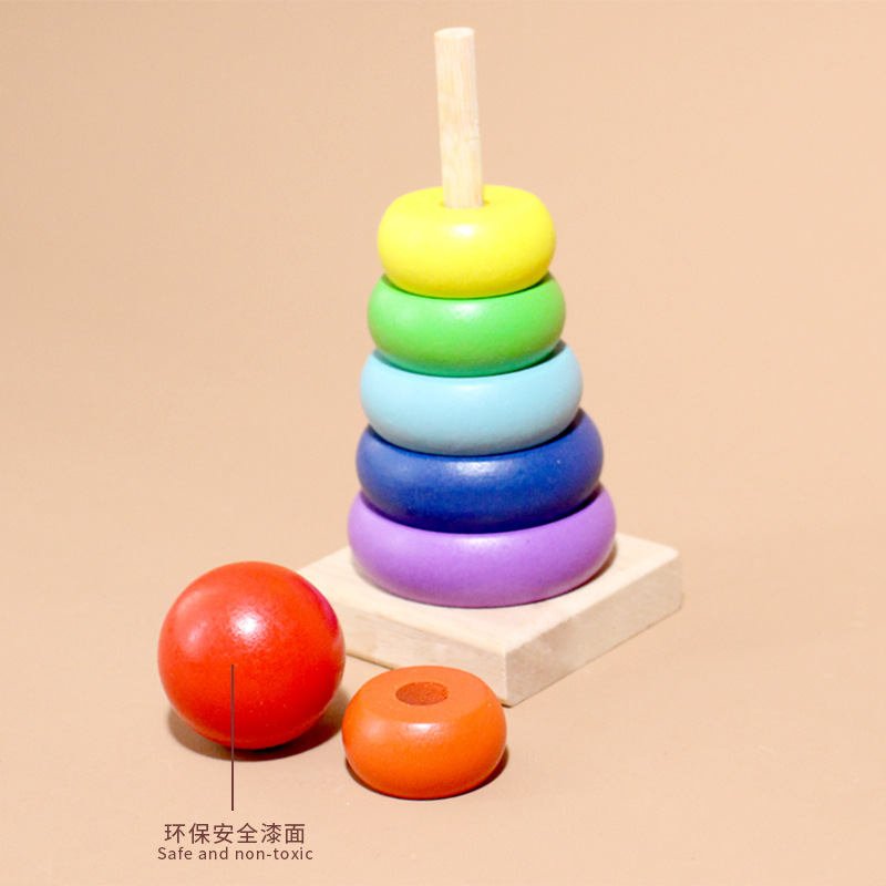 Directo de fábrica de madera de tamaño pequeño de siete capas de arco iris Torre jengle bebé anillo bloques de construcción educación temprana juguetes educativos