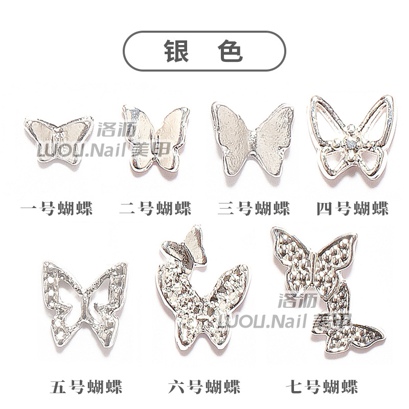 Nueva mariposa japonesa joyería de uñas en línea celebridad aleación tridimensional mariposa de una pieza mini mariposa hueca decoración de uñas