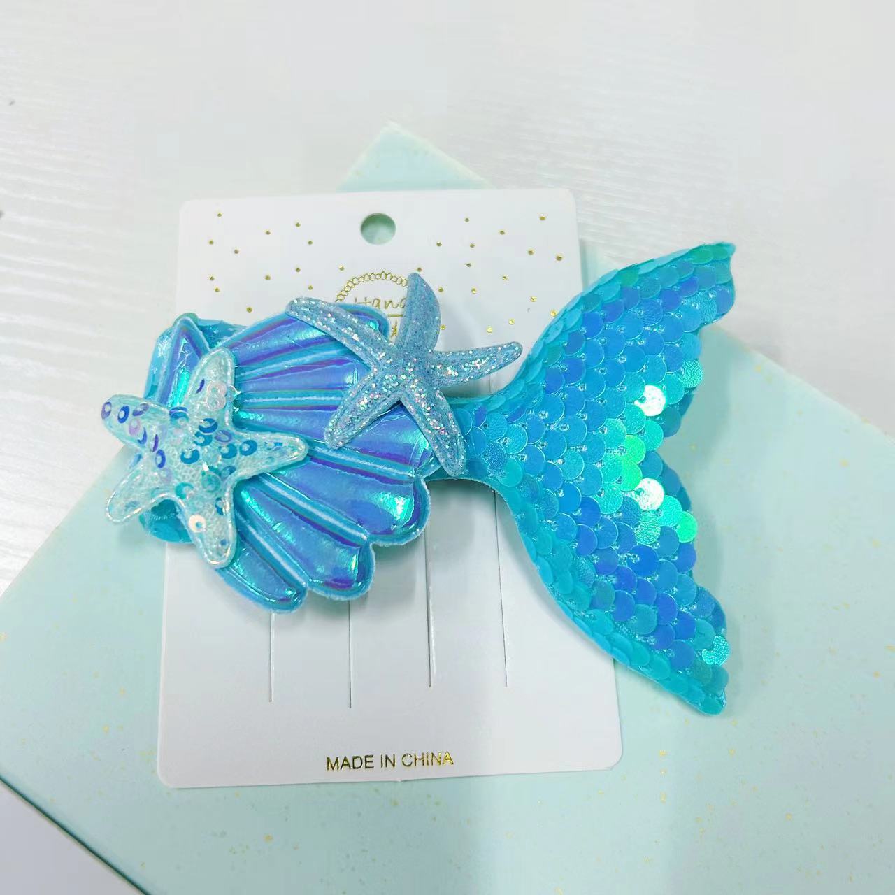 Nueva horquilla de cola de pescado lado brillante horquilla rota lentejuelas para niños show girls shell bangs clip