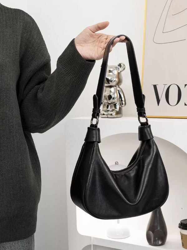 女性のためのニッチレトロ脇の下バッグ 2025 新しいファッションシングルショルダーソフトレザー通勤餃子バッグ女性のための多用途クロスボディバッグ|undefined