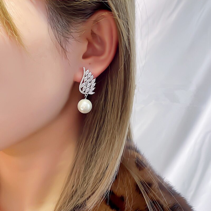 Boucles d oreilles pendantes perle ailes d ange élégantes_voghion.com